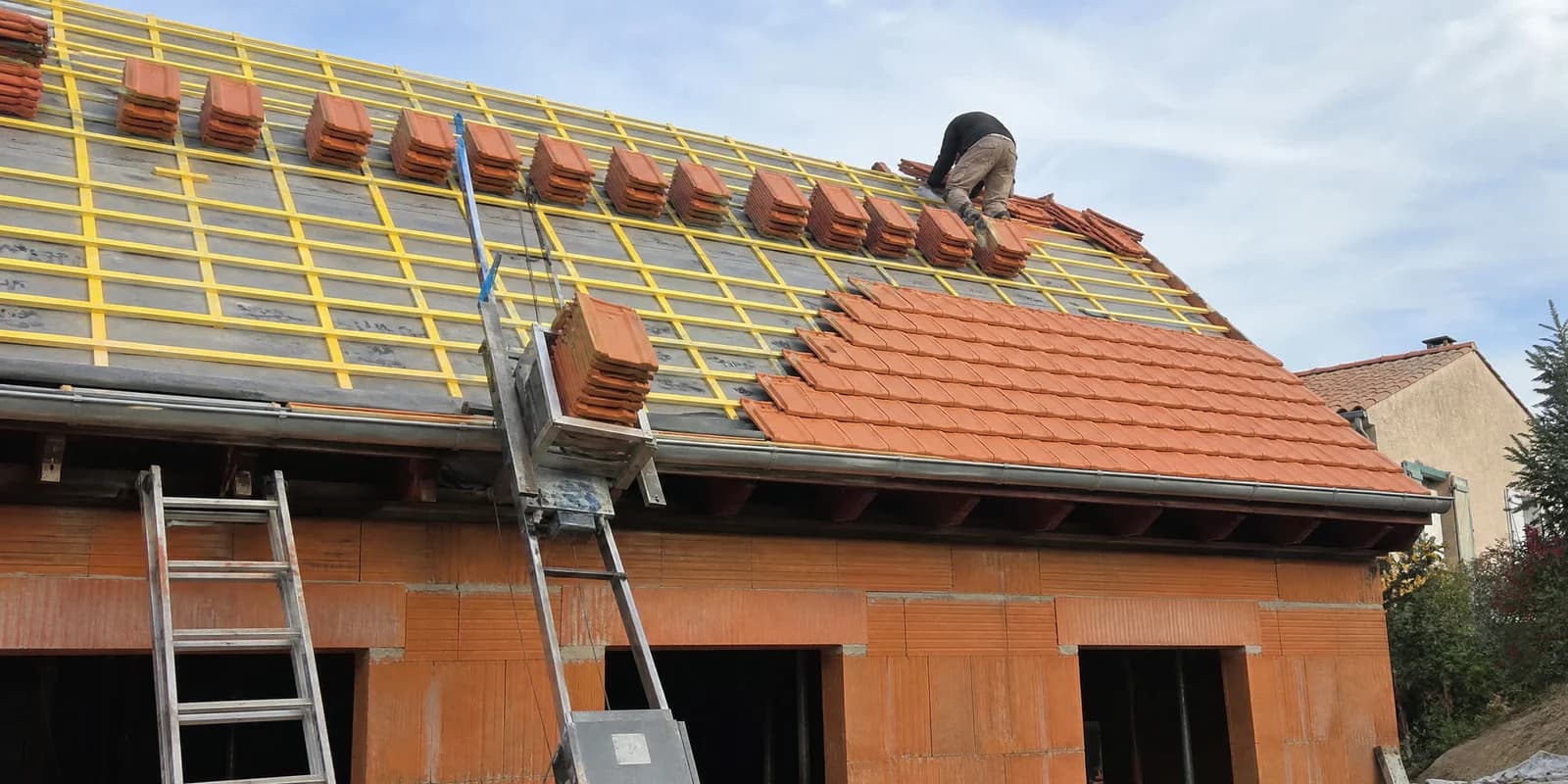 Couverture refaite avec écran sous-toiture sur maison de ville